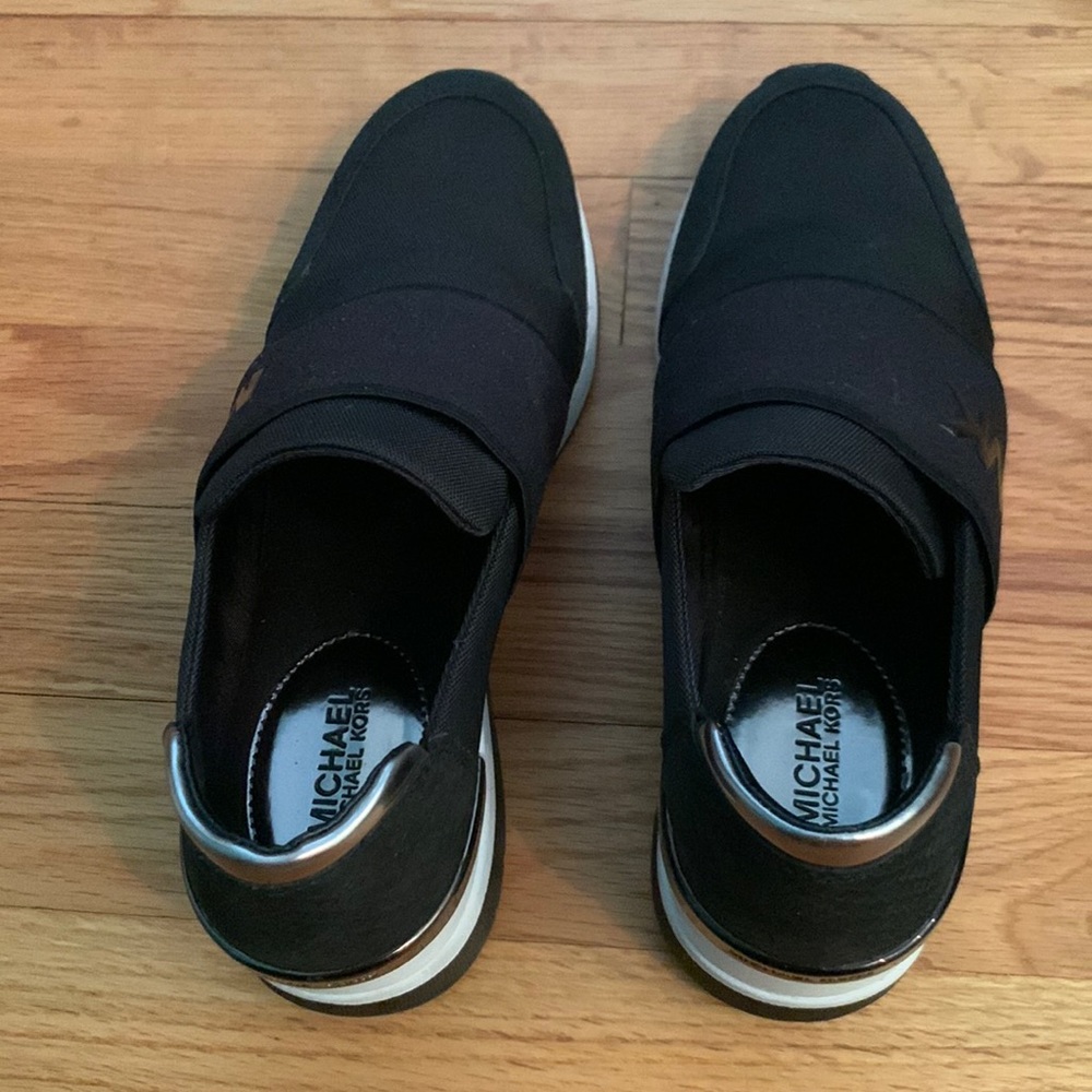 Michael Kors Wedge Slip on Sneakers. Very good condition. Size 7.5